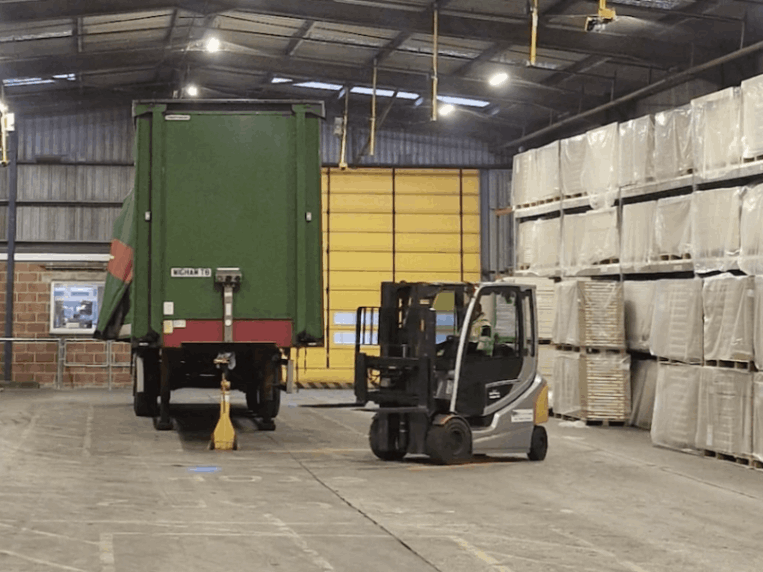 The back of a lorry, with a forklift next to it at JELD-WEN's Penrith manufacturing site.