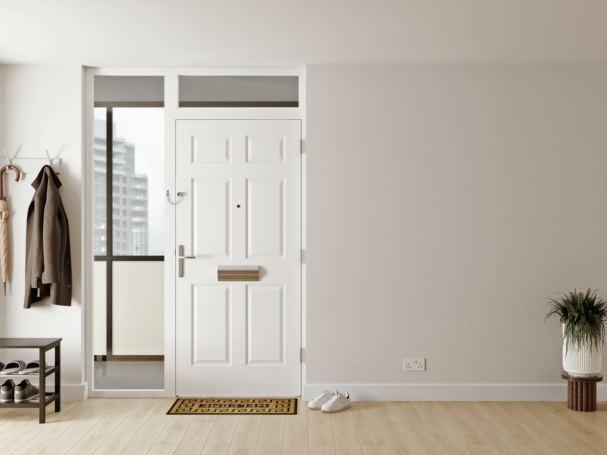 A white flat entrance doorset with side and top lights